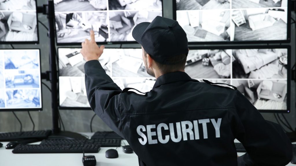 security guard viewing dashboards of cameras