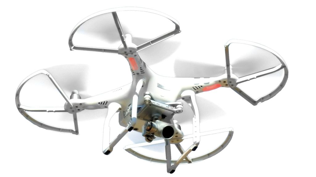 a white drone with blade protectors and camera