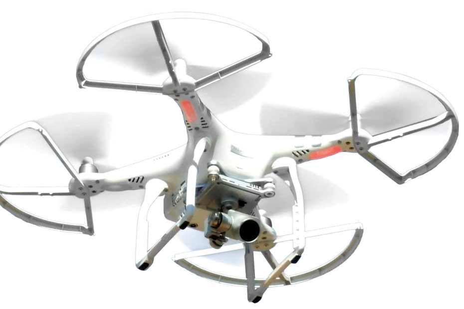 a white drone with blade protectors and camera