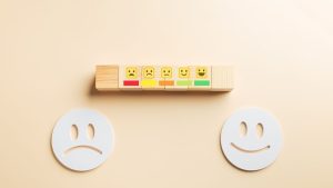 a smiley and frowny face indicating uswer experience